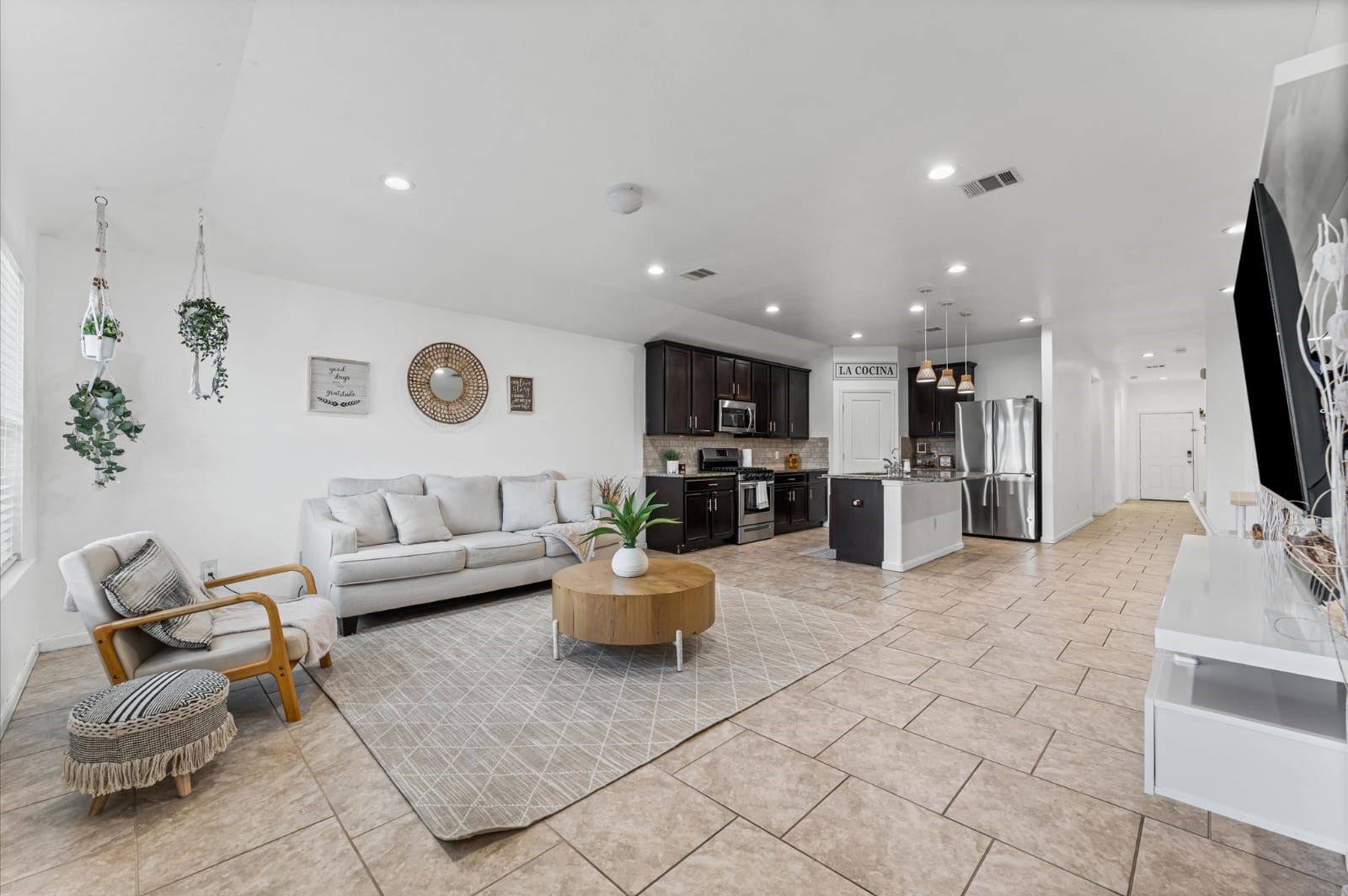 3007 Magellan Ridge Lane Baytown, TX 77521 - Photo 11 of 34 a living room with furniture and a flat screen tv