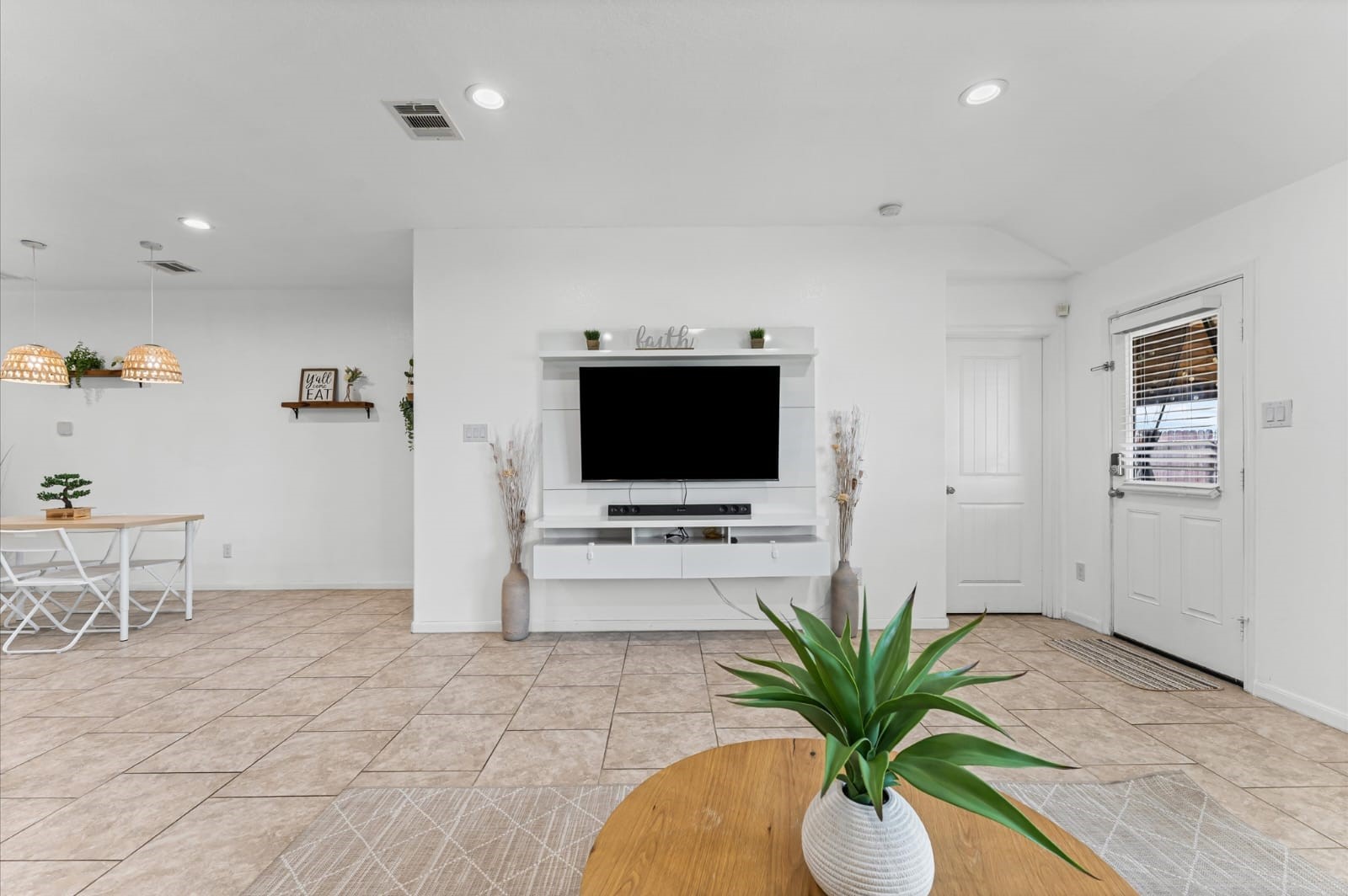 3007 Magellan Ridge Lane Baytown, TX 77521 - Photo 12 of 34 a living room with furniture and a flat screen tv