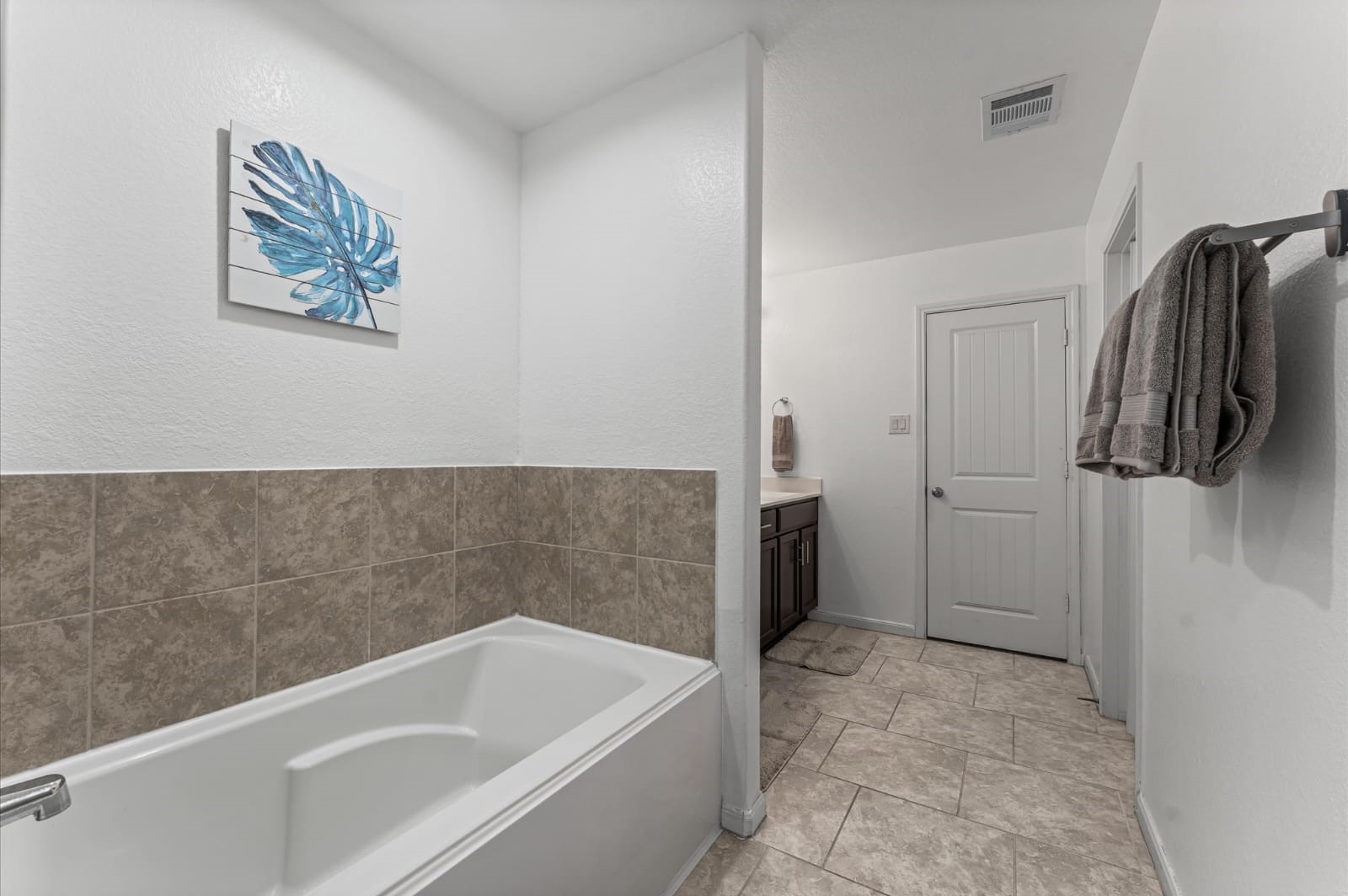 3007 Magellan Ridge Lane Baytown, TX 77521 - Photo 21 of 34 a bathroom with a bathtub and a shower