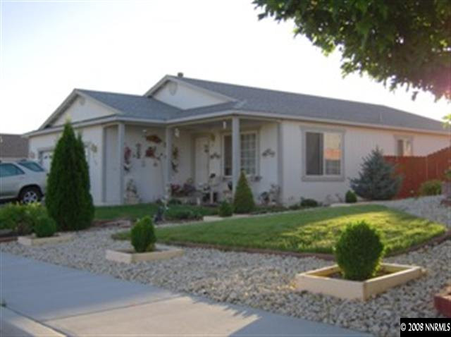 18461 Datewood Court Reno, NV 89508 - Photo 1 of 7 a front view of a house with garden
