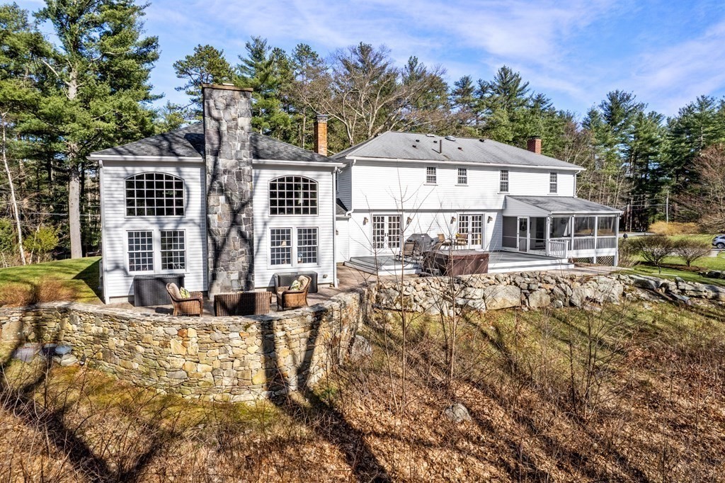 47 Wake Robin Road Sudbury, MA 01776 - Photo 29 of 41 front view of a house with a yard