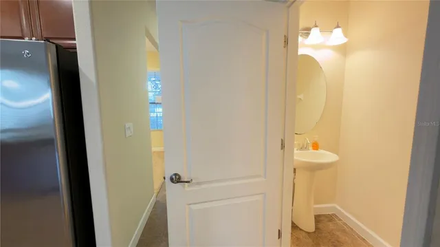 a bathroom with a mirror