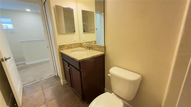 an empty room that has a window in it