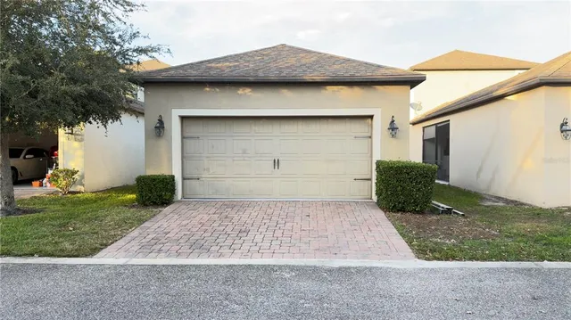 a view of a house with a park