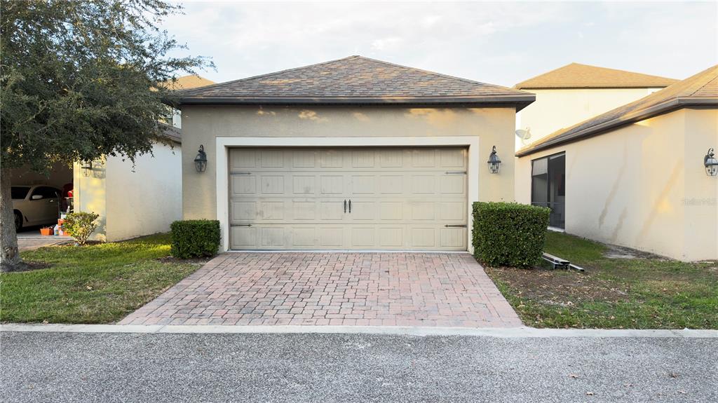 13040 Overstreet Road Windermere, FL 34786 - Photo 39 of 45 a front view of a house with a yard