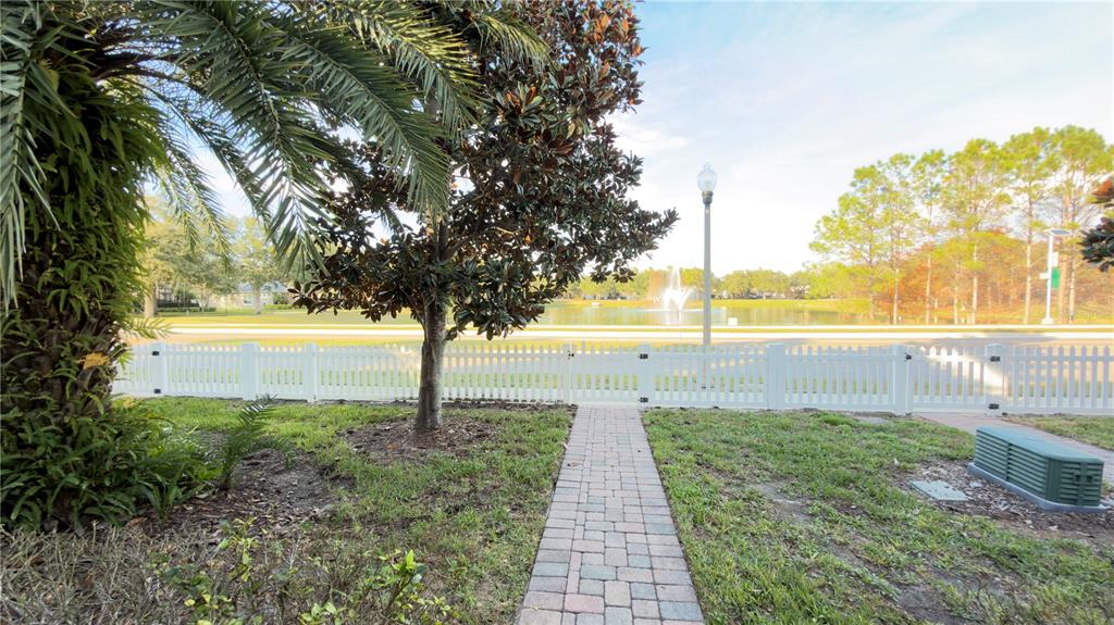 13040 Overstreet Road Windermere, FL 34786 - Photo 4 of 45 a view of a yard with an outdoor space