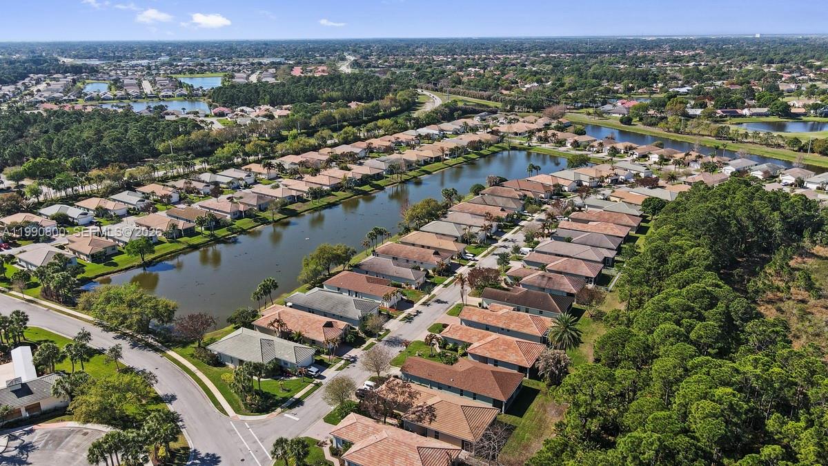 337 Southwest Maclay Way Port St. Lucie, FL 34986 - Photo 43 of 44 an aerial view of a city with lake view