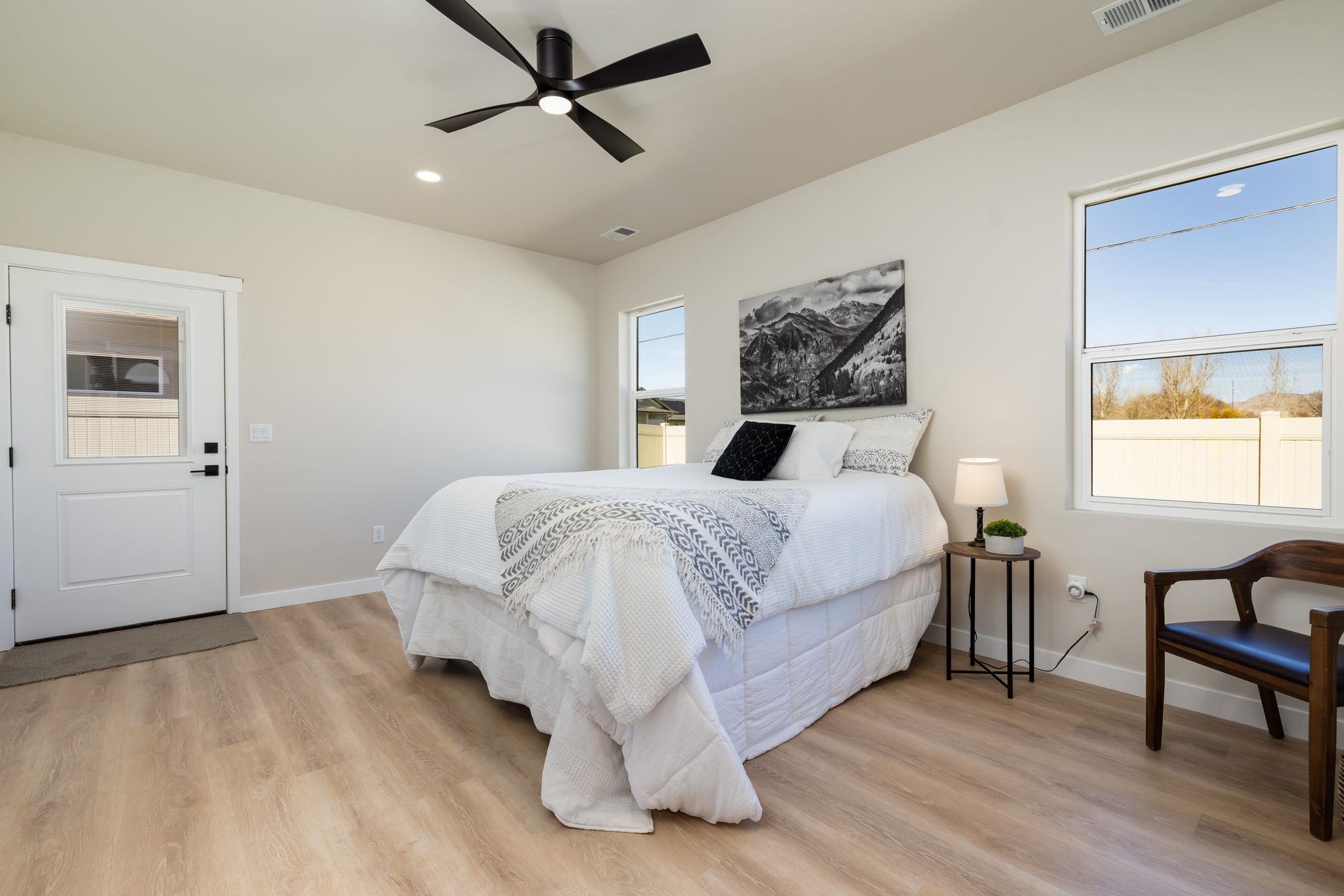 2956 Apollo Drive Grand Junction, CO 81504 - Photo 13 of 33 a bedroom with a bed and a table