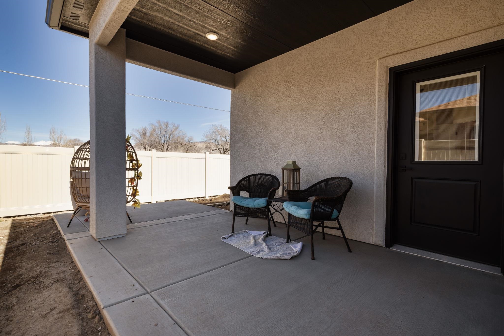 2956 Apollo Drive Grand Junction, CO 81504 - Photo 20 of 33 a dining room with furniture and a large window