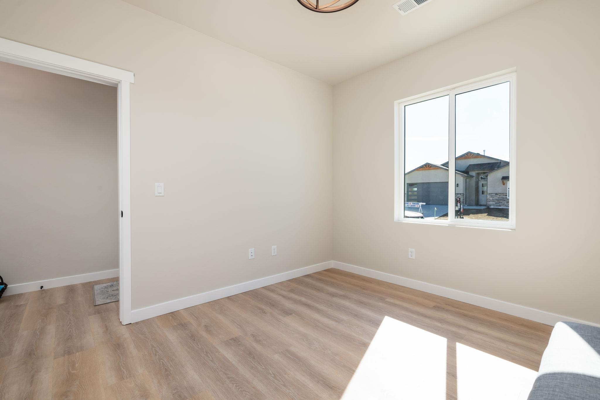 2956 Apollo Drive Grand Junction, CO 81504 - Photo 22 of 33 an empty room with a window