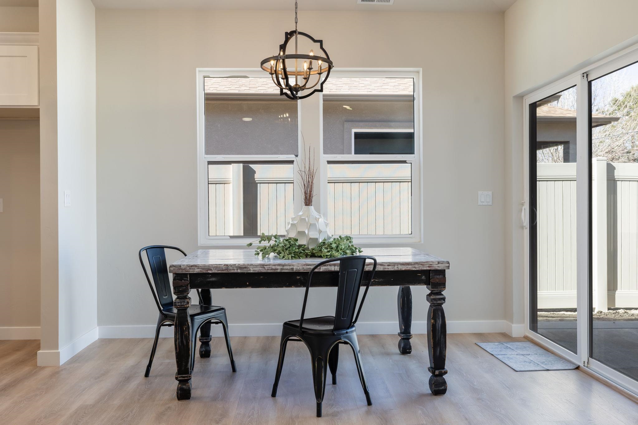 2956 Apollo Drive Grand Junction, CO 81504 - Photo 23 of 33 a view of a dining room with furniture and window