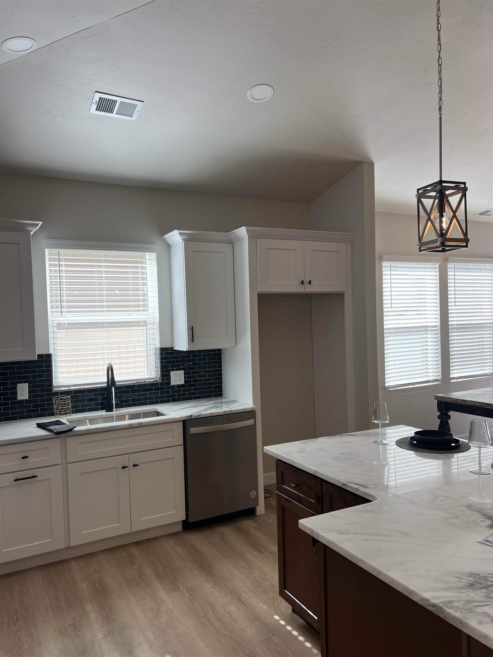 2956 Apollo Drive Grand Junction, CO 81504 - Photo 26 of 33 a kitchen with stainless steel appliances granite countertop a sink a stove and a refrigerator