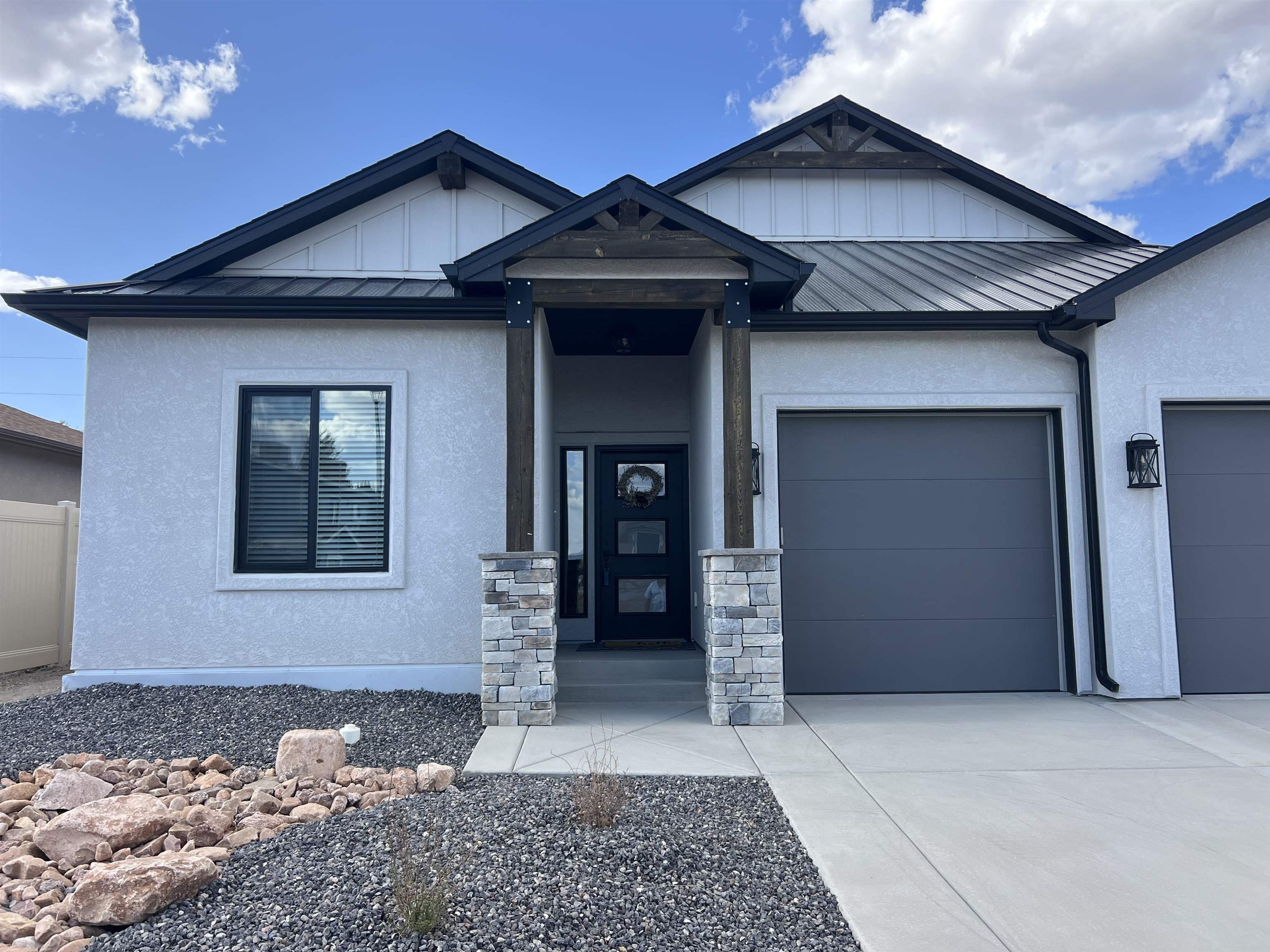 2956 Apollo Drive Grand Junction, CO 81504 - Photo 29 of 33 a front view of a house