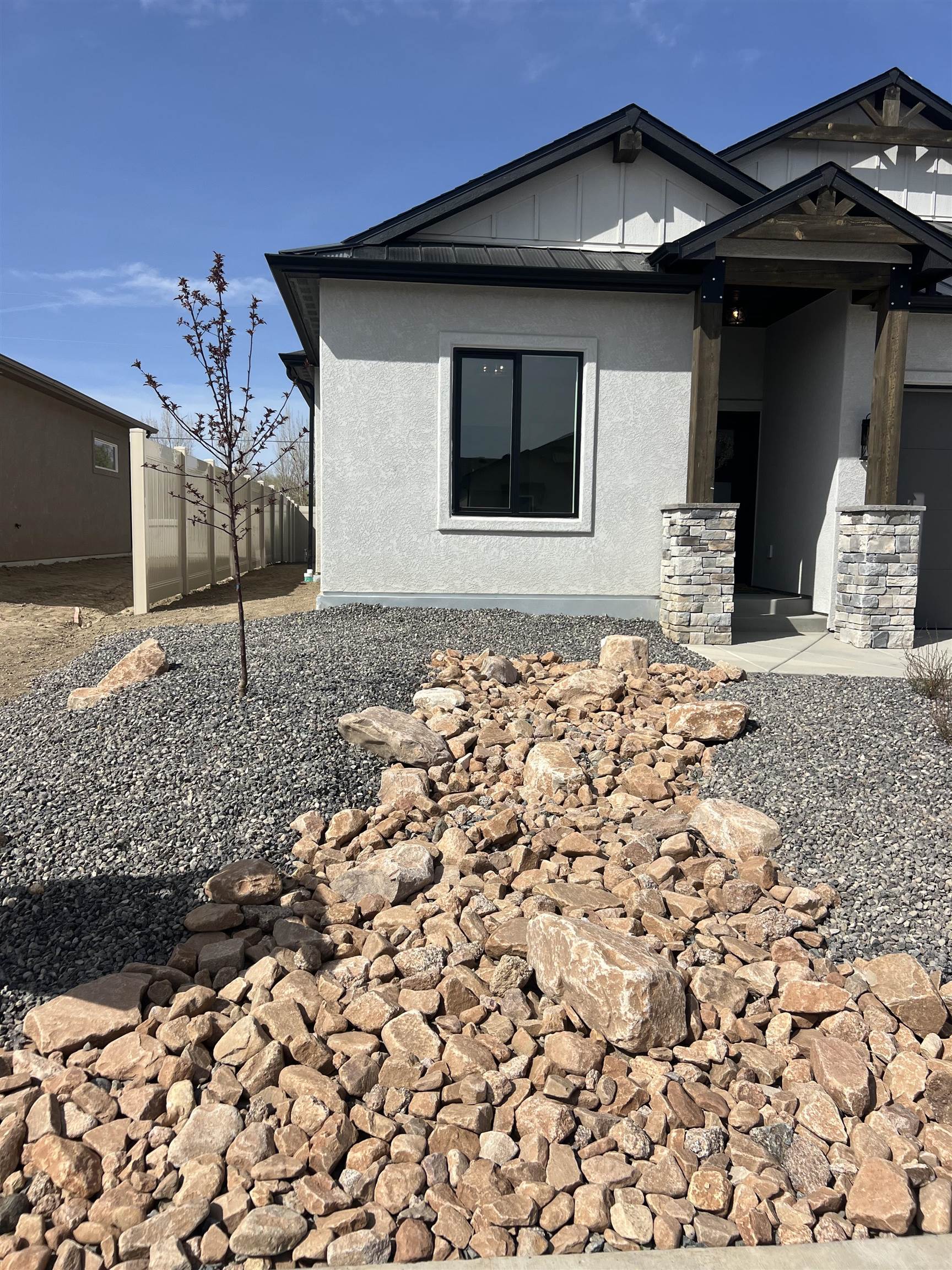 2956 Apollo Drive Grand Junction, CO 81504 - Photo 31 of 33 a front view of a house with a yard