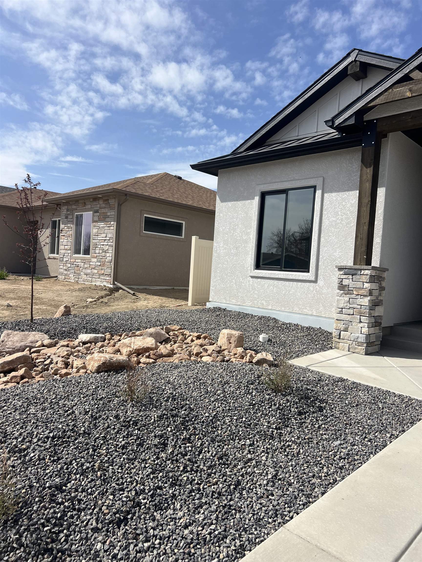 2956 Apollo Drive Grand Junction, CO 81504 - Photo 32 of 33 a front view of a house with a yard
