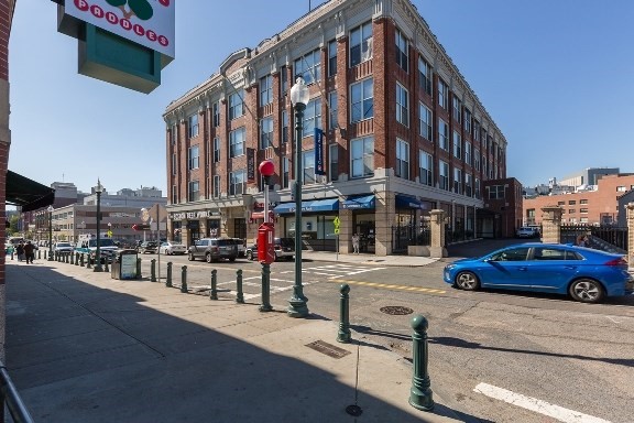 61 Brookline Avenue, Unit 214 Boston, MA 02215 - Photo 7 of 7 a car parked in front of a building