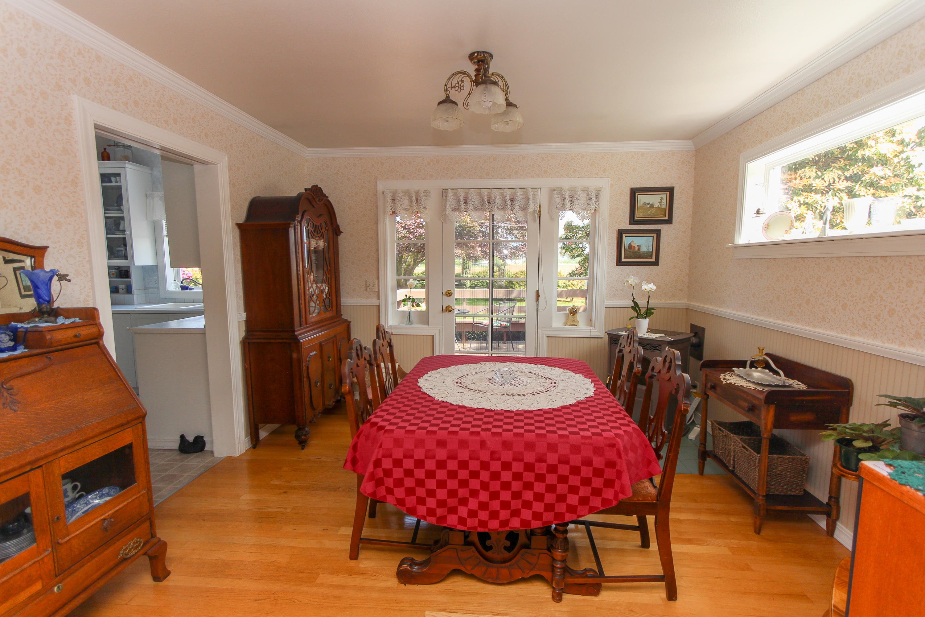 3225 Fitzpatrick Road Tillamook, OR 97141 - Photo 19 of 50 a view of a dining room with furniture window and wooden floor