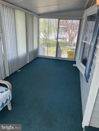 a view of livingroom with furniture and staircase