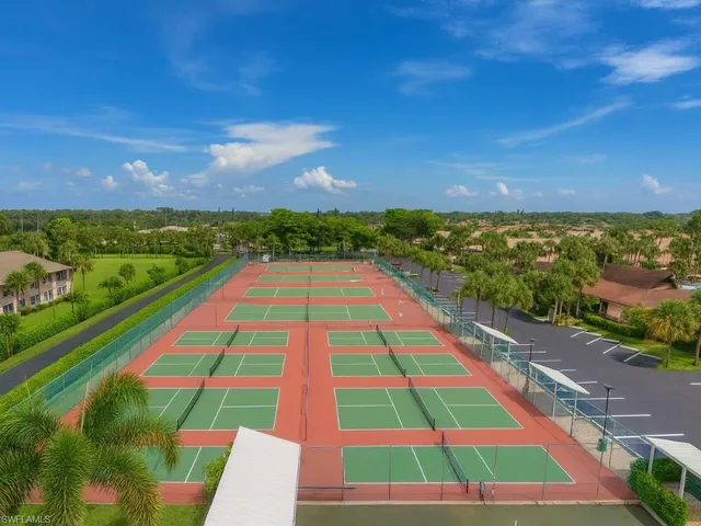 a view of outdoor space with pool and city view