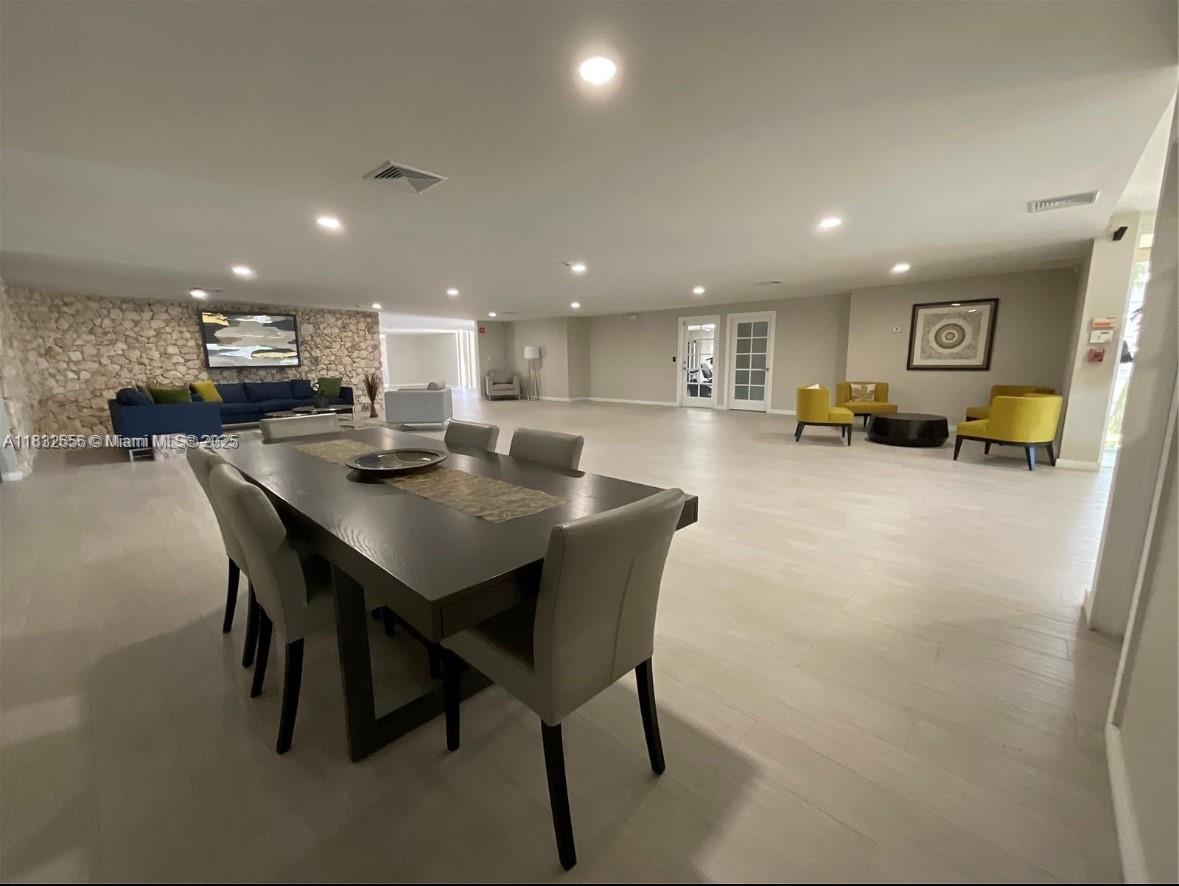 Kendall Miami, FL 33173 - Photo 12 of 20 a kitchen with a table and chairs in it