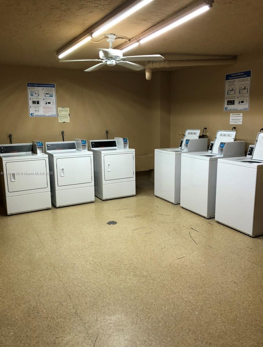 Kendall Miami, FL 33173 - Photo 10 of 20 a storage room with washer and dryer