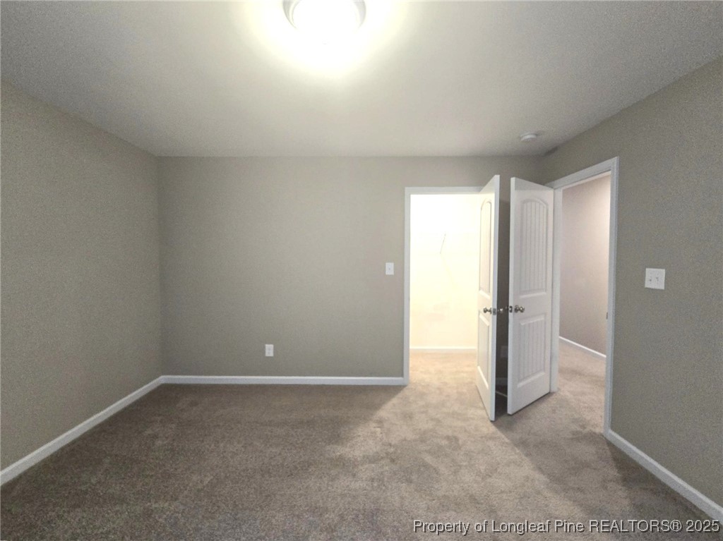 7018 Summerlin Drive Fayetteville, NC 28306 - Photo 35 of 39 a view of an empty room and window