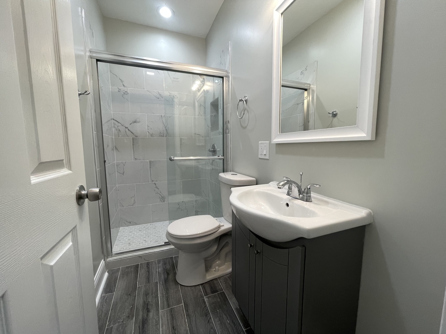 930 West 35th Street, Unit 2F Chicago, IL 60609 - Photo 6 of 13 a bathroom with a sink toilet and shower