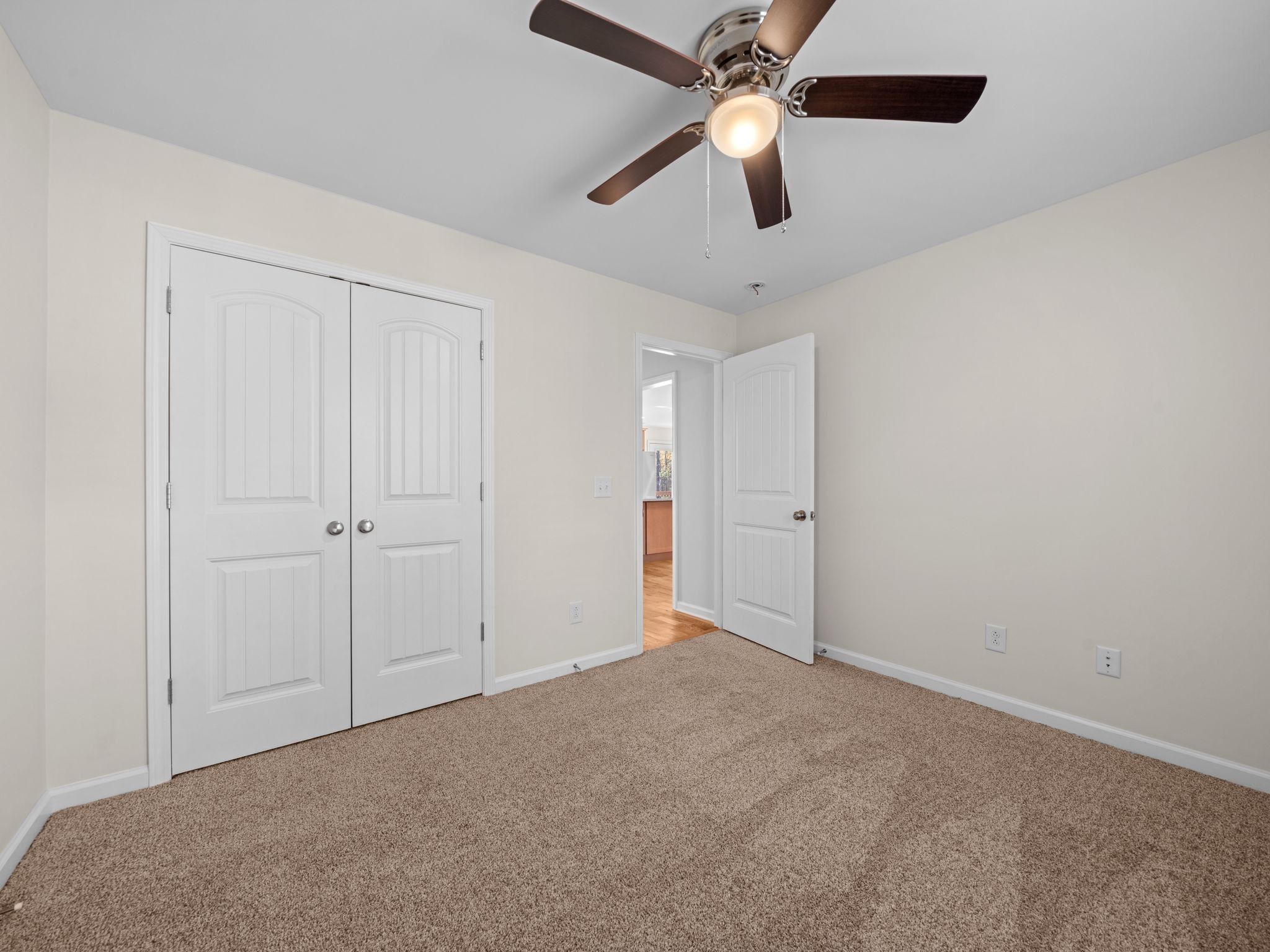 4413 Taylor Road Springfield, TN 37172 - Photo 14 of 28 an empty room with closet and a chandelier fan
