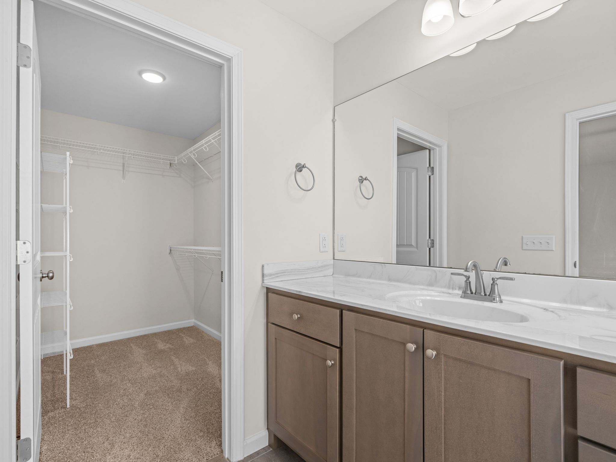 4413 Taylor Road Springfield, TN 37172 - Photo 20 of 28 a bathroom with a granite countertop sink and a mirror