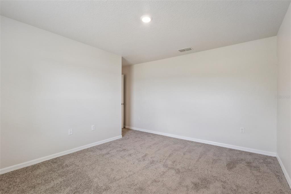 1613 Orne Street Mascotte, FL 34753 - Photo 19 of 31 a view of an empty room