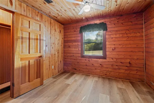 a view of outdoor space and wooden deck