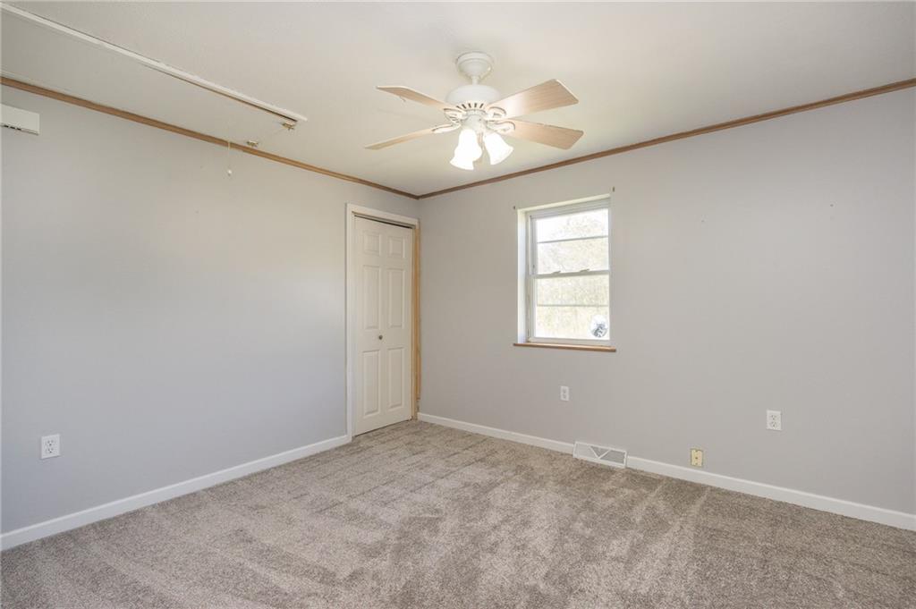 16 Engle Road Industry, PA 15052 - Photo 11 of 23 Second bedroom with new carpet and paint. Access to the attic from here (nice pull down stairs).