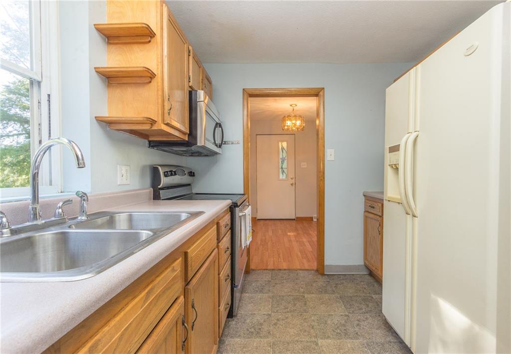 16 Engle Road Industry, PA 15052 - Photo 4 of 23 Kitchen flows nicely into the living/ dining rooms.