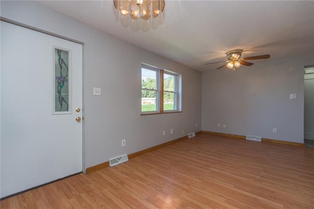 16 Engle Road Industry, PA 15052 - Photo 5 of 23 Front door of home and open concept living/ dining room. You decide how to set up the main floor living!