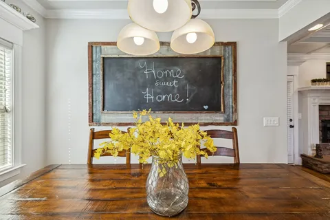 a kitchen with stainless steel appliances granite countertop a refrigerator stove and sink