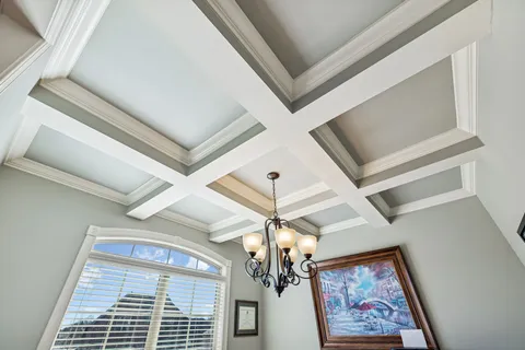 a living room with furniture and a rug