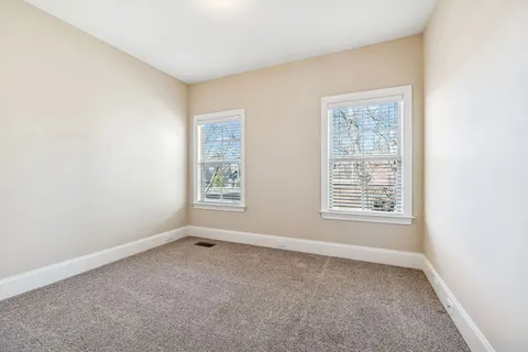 a view of a patio with swimming pool