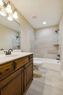 an aerial view of a city with lots of residential buildings