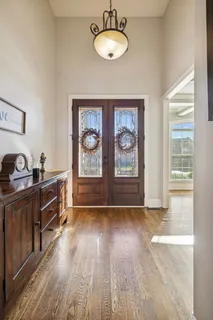 a living room with furniture or dining table and a fireplace