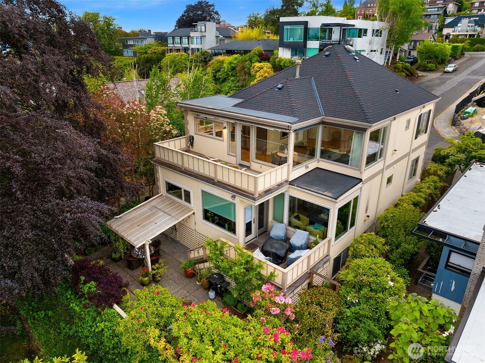 525 West Prospect Street, Unit A Seattle, WA 98119 - Photo 29 of 31 an aerial view of a house with a yard and potted plants