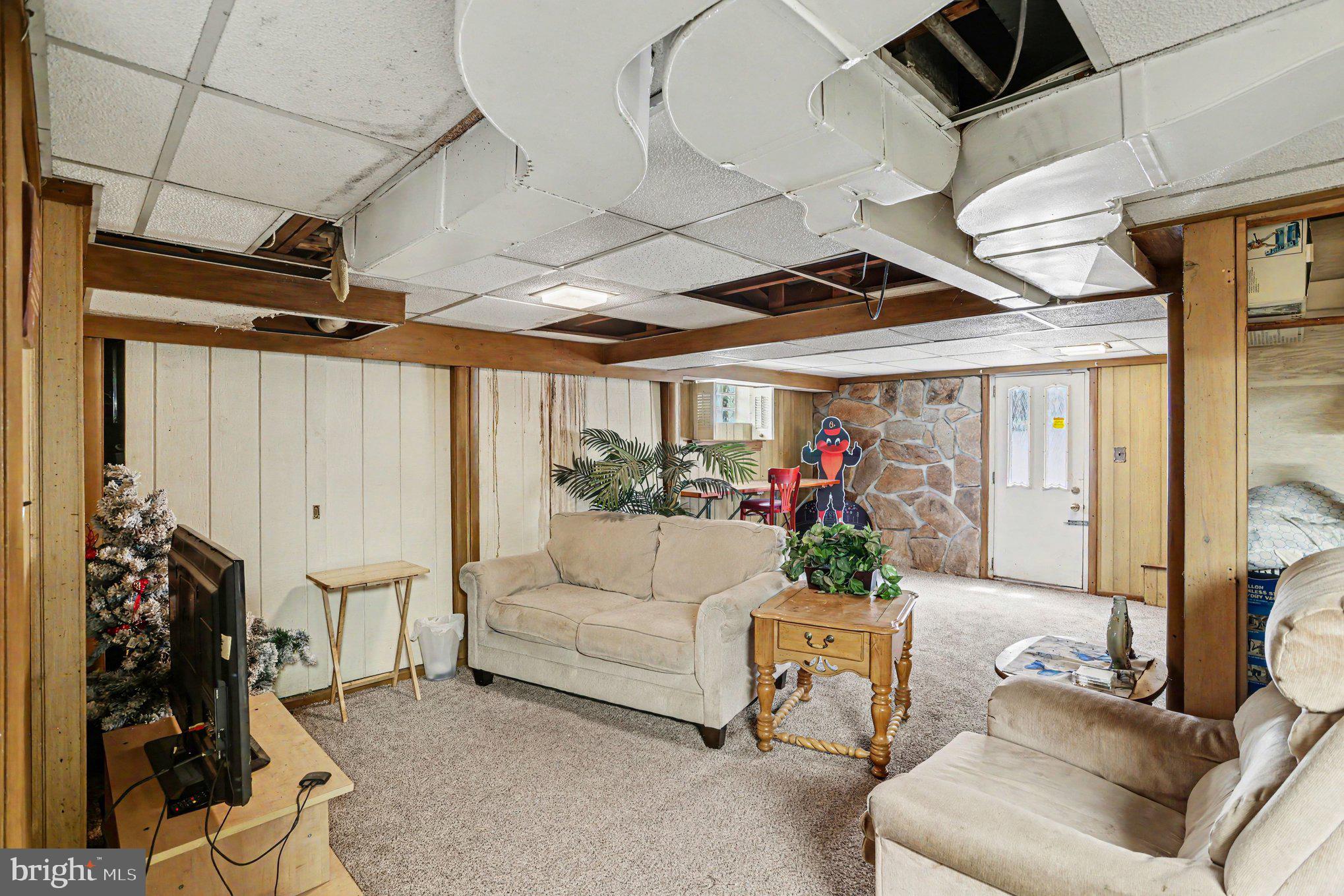 5912 Shady Spring Avenue Baltimore, MD 21237 - Photo 61 of 75 Cozy basement retreat with charm.