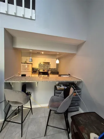 a view of a workspace with furniture