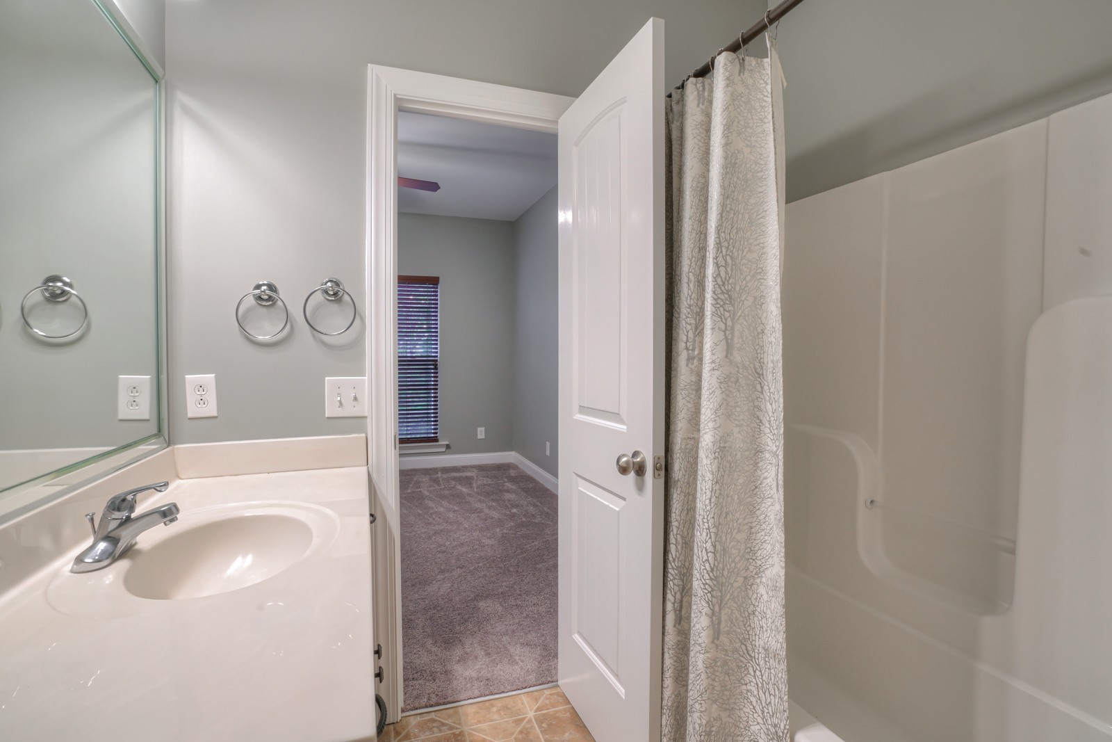 214 Rowlette Circle Murfreesboro, TN 37127 - Photo 12 of 27 a bathroom with a sink a toilet and shower