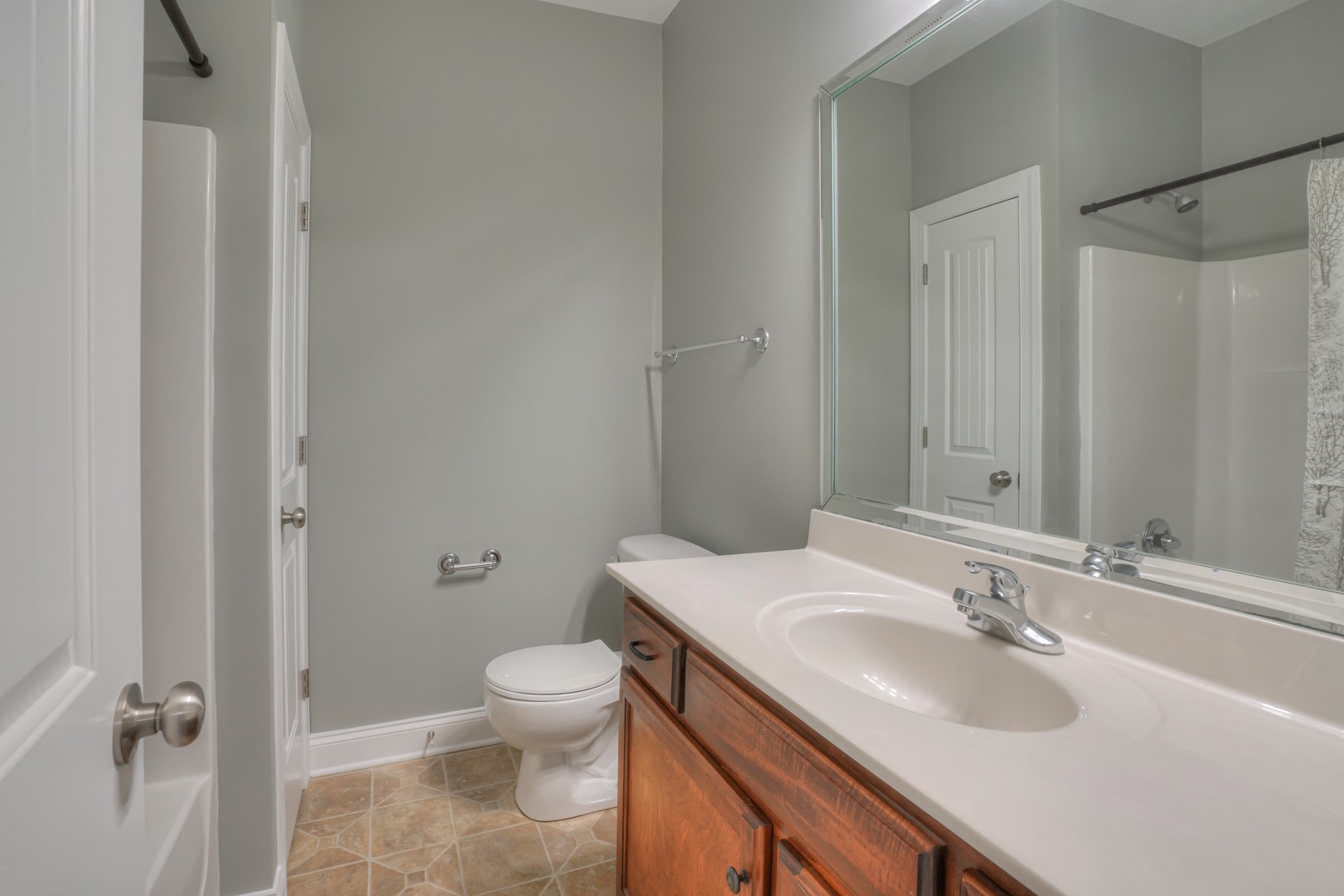 214 Rowlette Circle Murfreesboro, TN 37127 - Photo 13 of 27 a bathroom with a sink toilet and shower