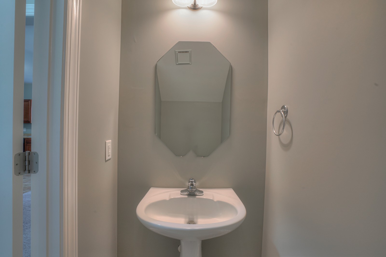 214 Rowlette Circle Murfreesboro, TN 37127 - Photo 3 of 27 a bathroom with a sink and mirror