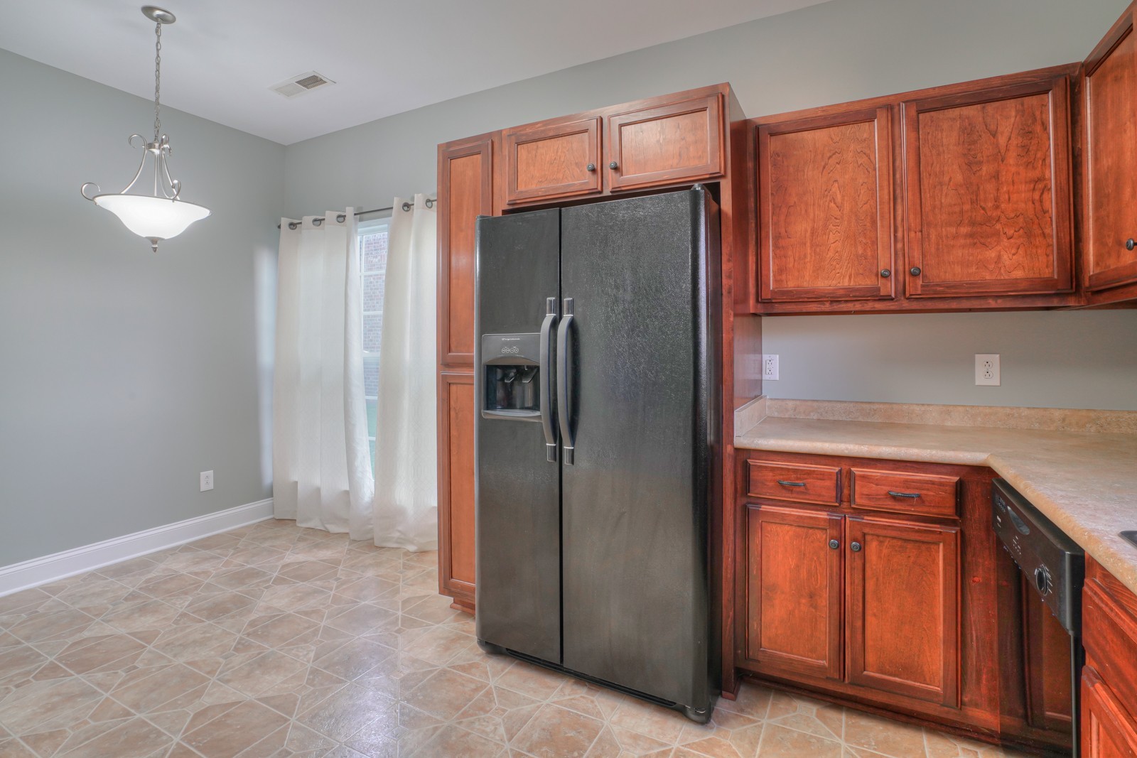 214 Rowlette Circle Murfreesboro, TN 37127 - Photo 8 of 27 a kitchen with stainless steel appliances granite countertop a refrigerator and a sink