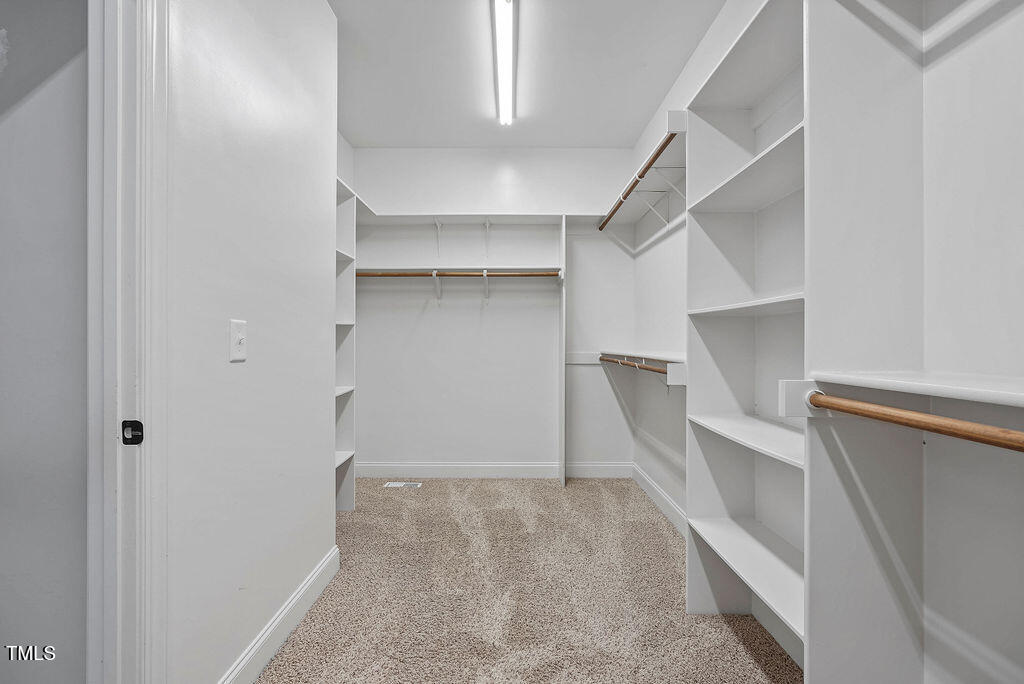 1124 Armsleigh Court Raleigh, NC 27603 - Photo 21 of 33 a view of an empty walk in closet