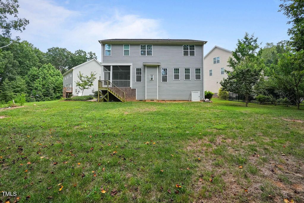 1124 Armsleigh Court Raleigh, NC 27603 - Photo 33 of 33 a view of a house with a big yard