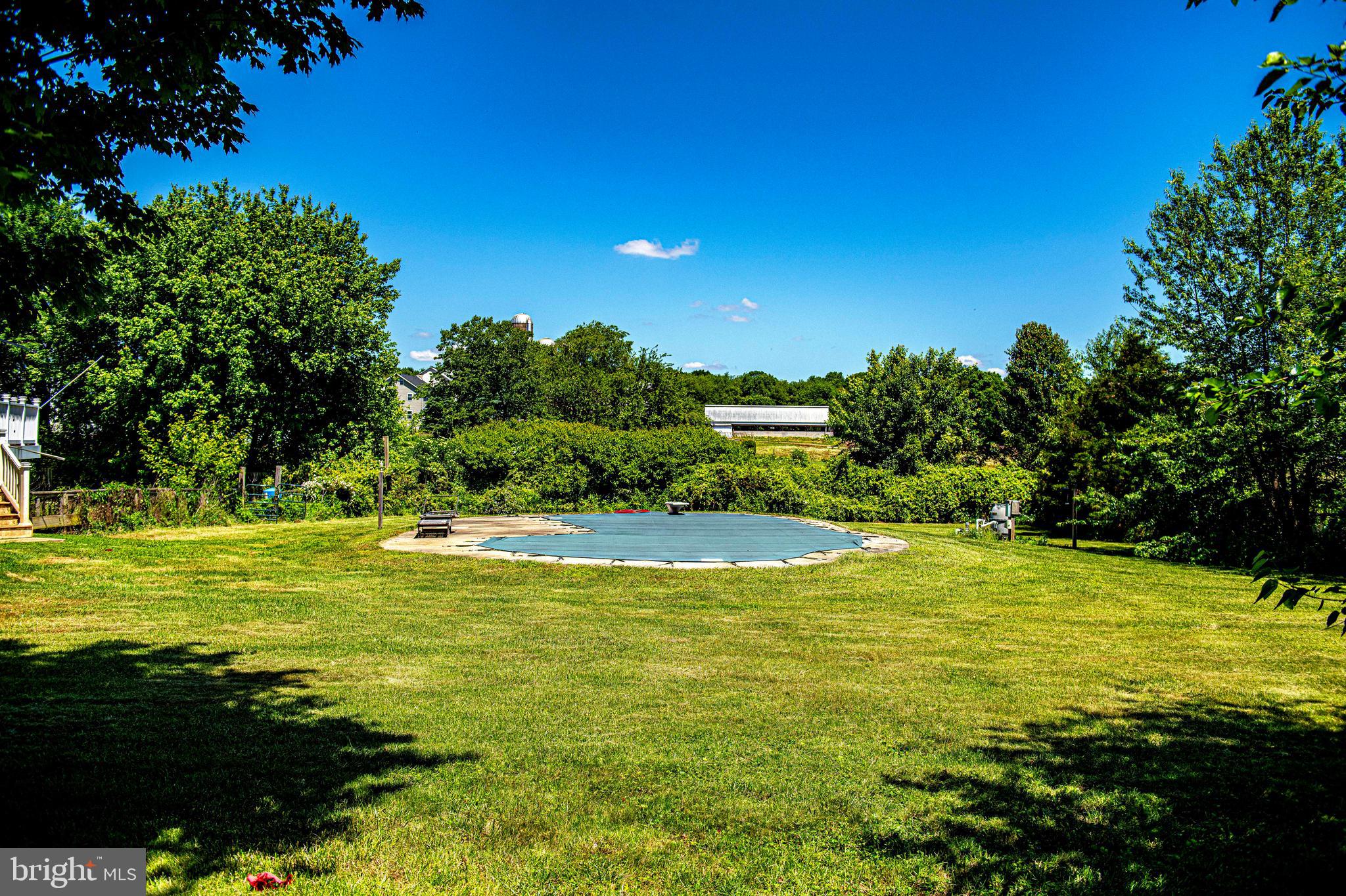 54 Mt Olivet Road Rising Sun, MD 21911 - Photo 39 of 66 a view of swimming pool with an outdoor space and seating area