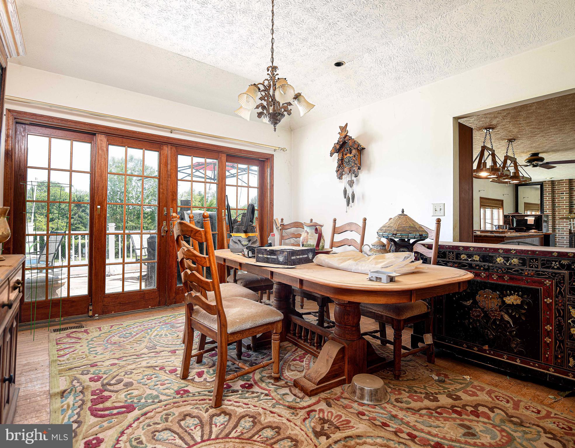 54 Mt Olivet Road Rising Sun, MD 21911 - Photo 10 of 66 a dining room with furniture a rug and wooden floor
